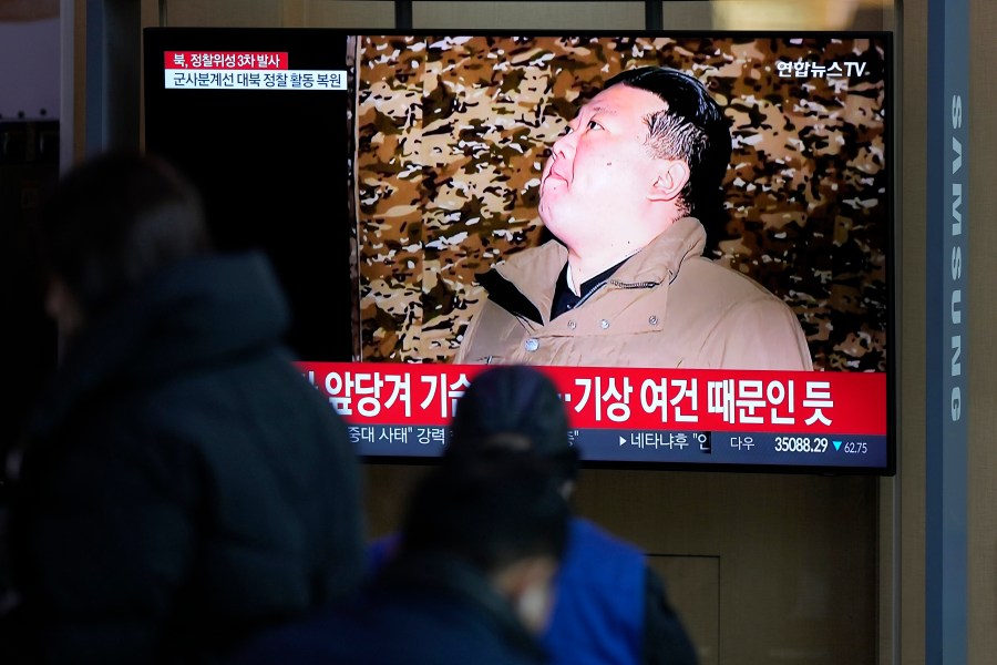 A TV screen shows a report on North Korea's spy satellite into orbit with its third launch attempt this year with an image of North Korea's leader Kim Jong Un during a news program at the Seoul Railway Station in Seoul, South Korea, Wednesday, Nov. 22, 2023. North Korea claimed Wednesday to have successfully placed a spy satellite into orbit with its third launch attempt this year, demonstrating the nation's determination to build a space-based surveillance system during protracted tensions with the United States. The letters read "North Korea, third launch of a spy satellite." (AP Photo/Lee Jin-man)