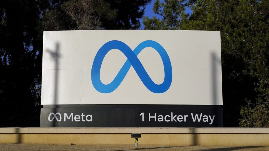 FILE - Meta's logo is seen on a sign, Nov. 9, 2022, at the company's headquarters in Menlo Park, Calif. Facebook and Instagram fail to protect underage users from exposure to child sexual abuse material and let adults solicit pornographic imagery from them, New Mexico's attorney general alleges in a lawsuit filed Tuesday, Dec. 5, 2023, that follows an undercover online investigation into Meta’s social media platforms. (AP Photo/Godofredo A. Vásquez, File)