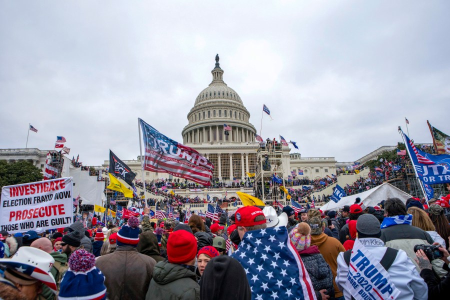 FILE - Rioters loyal to President Donald Trump at the U.S. Capitol in Washington, Jan. 6, 2021. A former leader of the far-right Proud Boys extremist group has been sentenced to more than three years behind bars for joining a plot to attack the U.S. Capitol nearly three years ago. Charles Donohoe was the second Proud Boy to plead guilty to conspiring with other group members to obstruct the Jan. 6, 2021, joint session of Congress for certifying President Joe Biden’s electoral victory. (AP Photo/Jose Luis Magana, File)