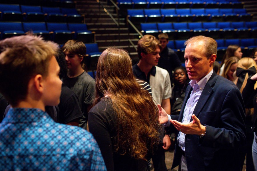 Minnesota Secretary of State Steve Simon talks to students after a Q&A with members of Voterama, a student group focused on voter advocacy and awareness at Breck School in Golden Valley, Minn. Friday, Dec. 1, 2023. (AP Photo/Nicole Neri)