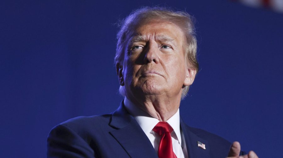 FILE - Former President Donald Trump speaks at a campaign rally, Saturday, Dec. 16, 2023, in Durham, N.H. Trump is facing criticism for repeatedly harnessing rhetoric once used by Adolf Hitler to argue that immigrants entering the U.S. illegally are “poisoning the blood of our country. Trump insists he had no idea that one of the world’s most reviled and infamous figures once used similar words. (AP Photo/Reba Saldanha, File)