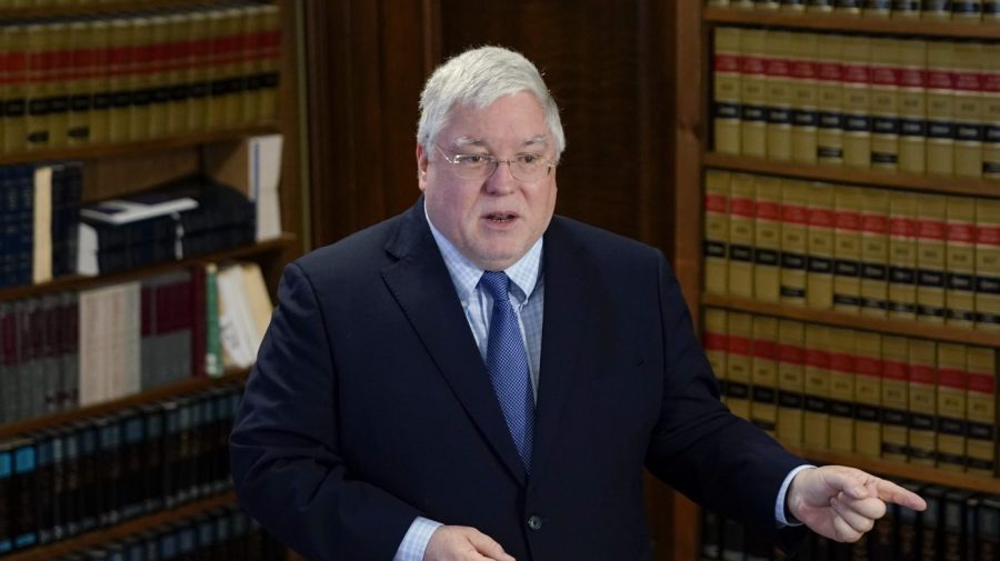 West Virginia Attorney General Patrick Morrisey speaks with reporters during a news conference.