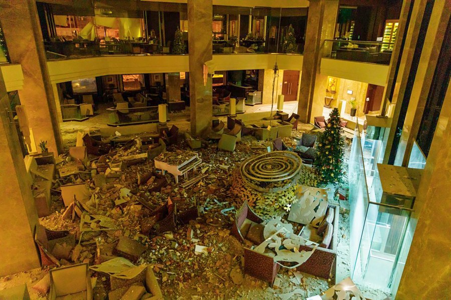 In this photo provided by Kharkiv Regional Administration, the ruined lobby of Kharkiv Palace Hotel is seen after Russia's missile attack in Kharkiv, Ukraine, Sunday, Dec. 31, 2023. (Kharkiv Regional Administration via AP)