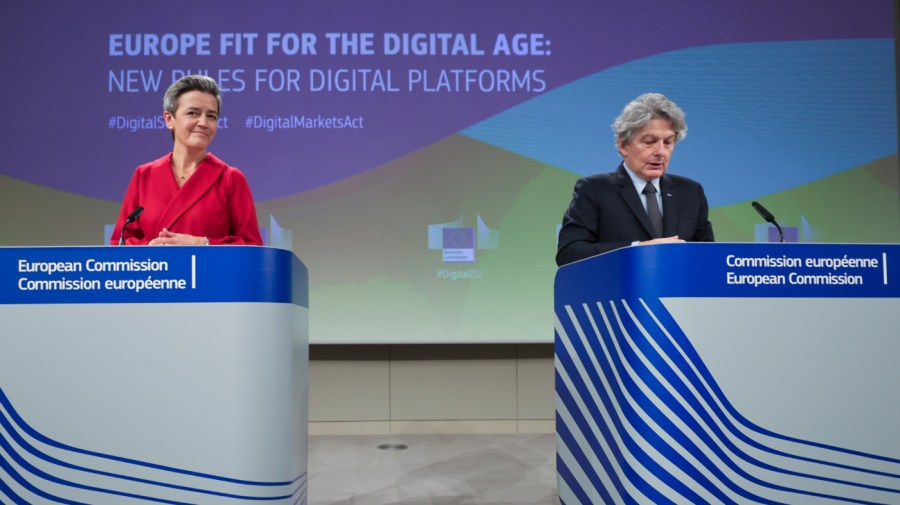 European Commissioner for Europe fit for the Digital Age Margrethe Vestager, left, and European Commissioner for Internal Market Thierry Breton during a news conference on Digital Services Act and the Digital Markets Act at the European Commission headquarters in Brussels, Tuesday, Dec. 15, 2020.