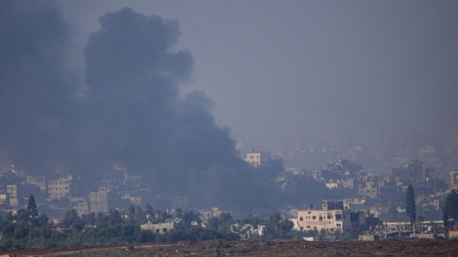 Smoke rises following an Israeli airstrike in the Gaza Strip, as seen from southern Israel, Friday, Dec. 1, 2023.