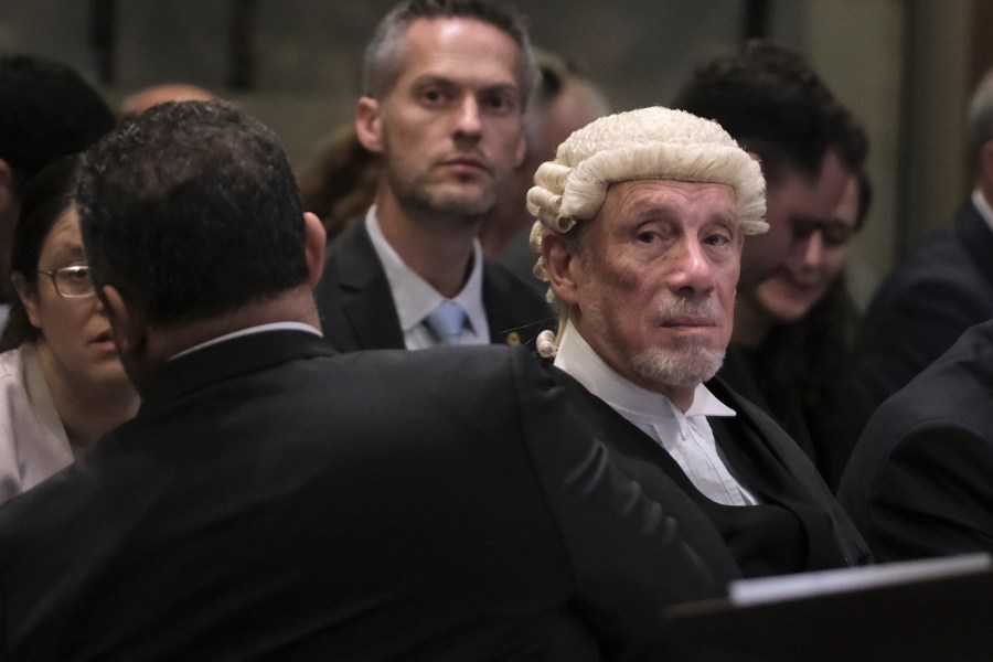 British jurist Malcolm Shaw, right, looks on during a hearing at the International Court of Justice in The Hague, Netherlands, Friday, Jan. 12, 2024. The United Nations' top court opened hearings Thursday into South Africa's allegation that Israel's war with Hamas amounts to genocide against Palestinians, a claim that Israel strongly denies. (AP Photo/Patrick Post)