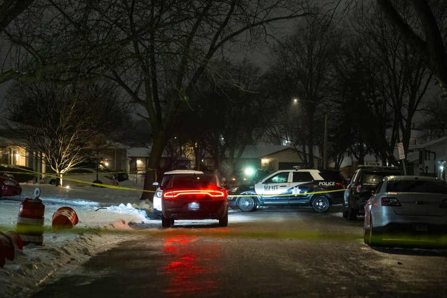 Police work a scene, Monday, Jan. 22, 2024, in Joliet, Ill., after multiple people were shot and killed over two days at three locations in the Chicago suburbs. (Tyler Pasciak LaRiviere/Chicago Sun-Times via AP)