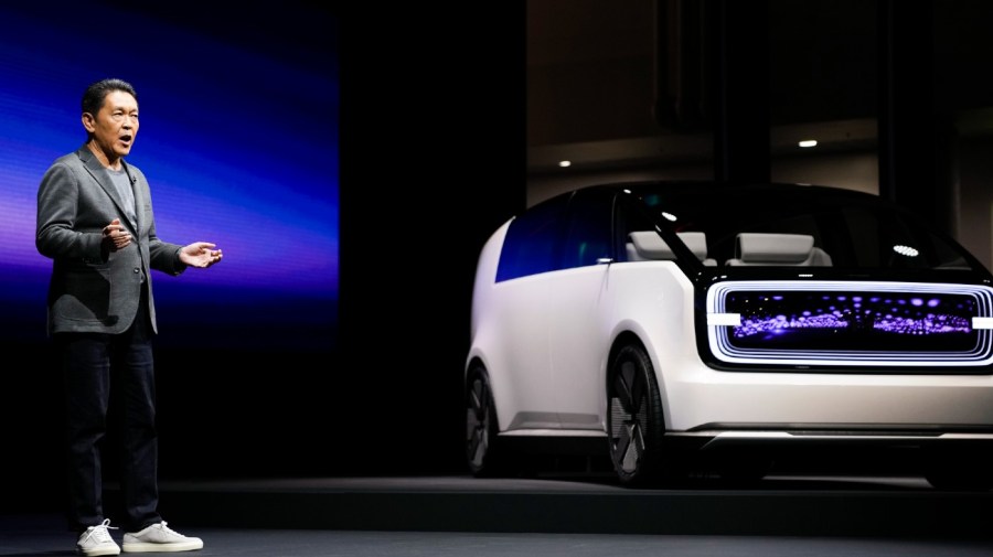 Shinji Aoyama, director, executive vice president and representative officer, Honda Motor Co., speaks next to the newly unveiled concept car, the Honda Zero Series "Space-Hub" electric vehicle during a Honda news conference during the CES tech show Tuesday, Jan. 9, 2024, in Las Vegas.