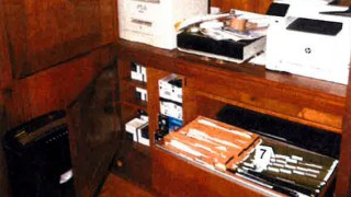 This image, contained in the report from special counsel Robert Hur, shows notebooks in a file cabinet under a printer that were seized in first-floor home office of President Joe Biden in Wilmington, Del., on Jan. 20, 2023, during a search by FBI agents. (Justice Department via AP)