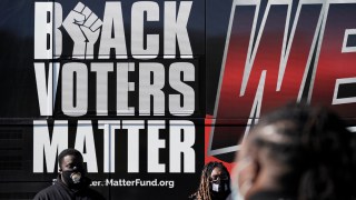 Supporters of Black Voters Matter gather at a polling site at the Graham Civic Center in Graham, N.C., Tuesday, Nov. 3, 2020.