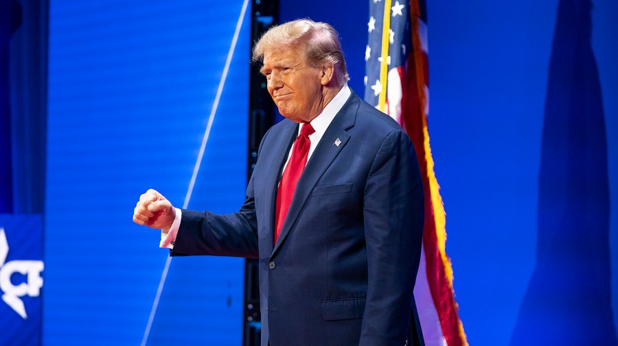 Former President Trump arrives on-stage to address the Conservative Political Action Conference