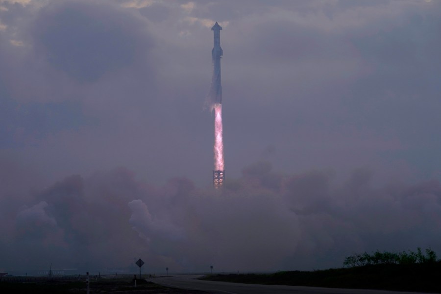 SpaceX's mega rocket Starship launches at dawn in the haze on it's third test flight from Starbase in Boca Chica, Texas, Thursday, March 14, 2024. (AP Photo/Eric Gay)