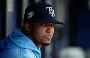 FILE - Tampa Bay Rays' Wander Franco looks on during a baseball game Aug. 13, 2023, in St. Petersburg, Fla. Tampa Bay All-Star shortstop Wander Franco was placed on administrative leave through June 1 under an agreement between Major League Baseball and the players' association while the investigation continues in an alleged relationship with a minor. The Rays open the season Thursday, March 28, 2024, against Toronto, forcing MLB and the union to make a decision on Franco's roster status. (AP Photo/Chris O'Meara, File)