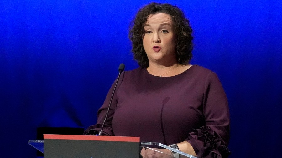 Representative Katie Porter speaks on stage.