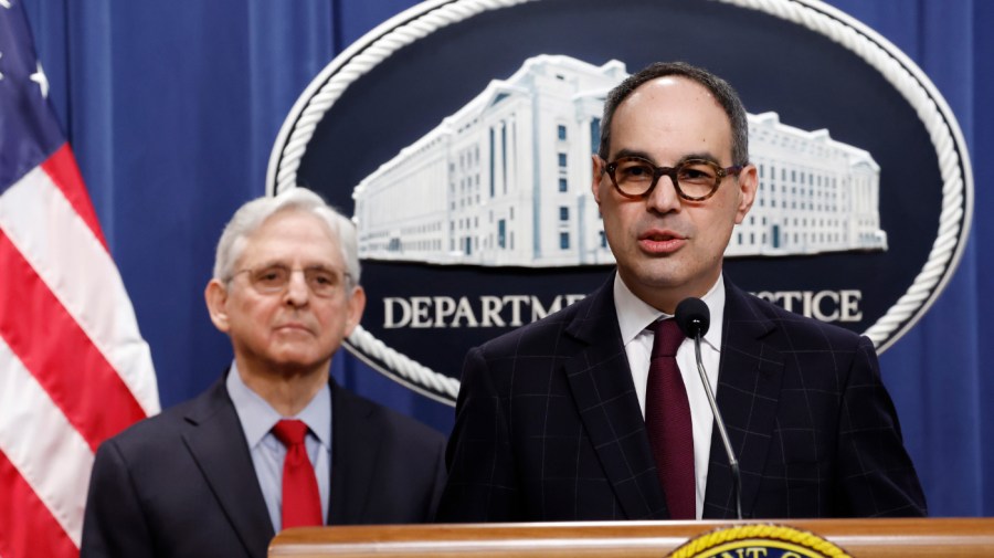 Jonathan Kanter, Assistant Attorney General for the Department of Justice Antitrust Division, speaks alongside U.S. Attorney General Merrick Garland during a news conference at the Department of Justice Building on March 21, 2024 in Washington, DC.