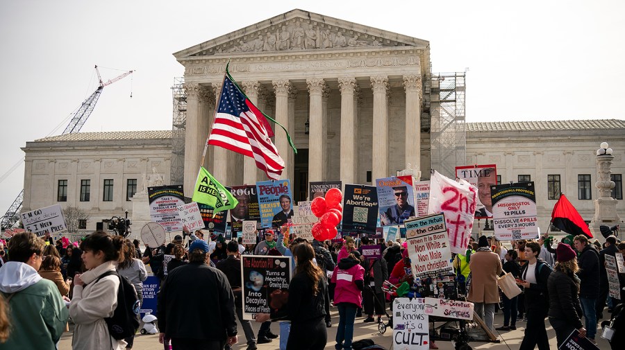 Supporters for and against abortion are seen outside the Supreme Court