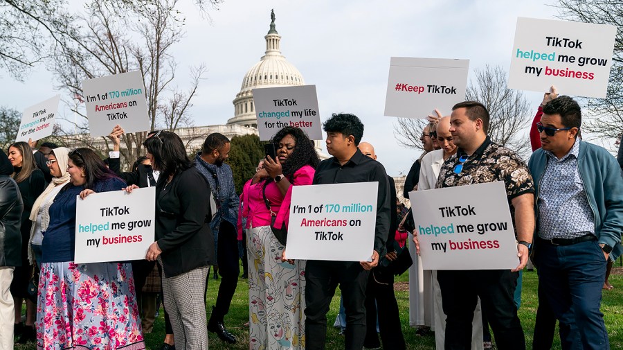 Tok creators are seen outside the U.S. Capitol