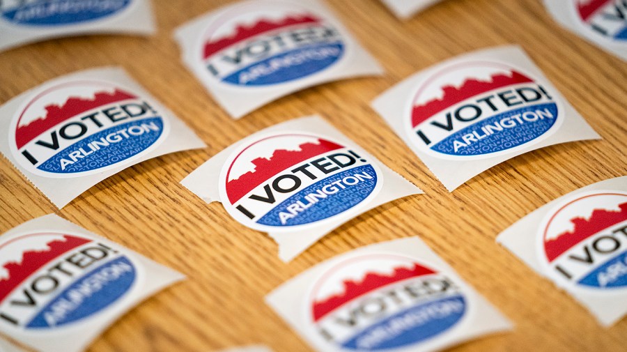 ‘I Voted’ stickers are seen at the H-B Woodlawn Secondary Program polling station in Arlington, Va.