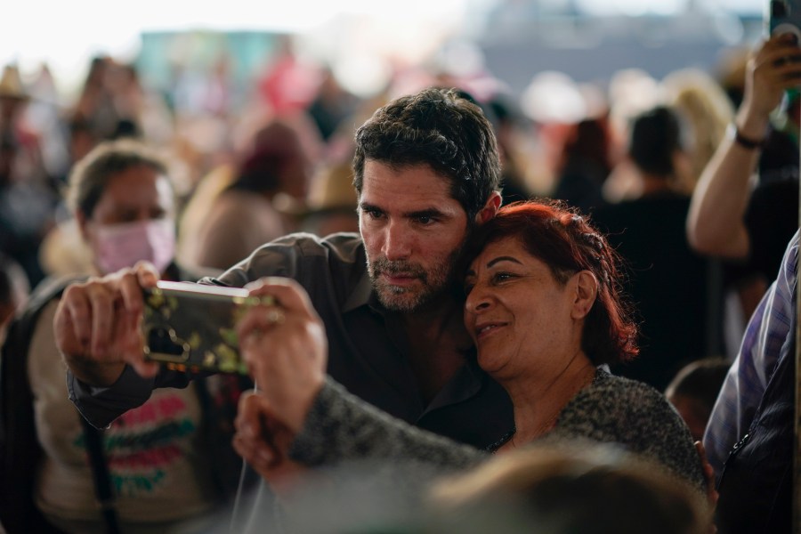 FILE - Presidential hopeful Eduardo Verastegui poses for a selfie with a supporter during a rally to collect signatures to enable him to run as an independent candidate, in San Bartolo del Valle, Mexico, Nov. 10, 2023. Thousands of people supported the presidential aspirations of Verástegui, a right-wing activist and film producer who — although his campaign faltered — echoed the voices of conservatives rejecting abortion and LGBTQ+ rights. (AP Photo/Eduardo Verdugo, File)