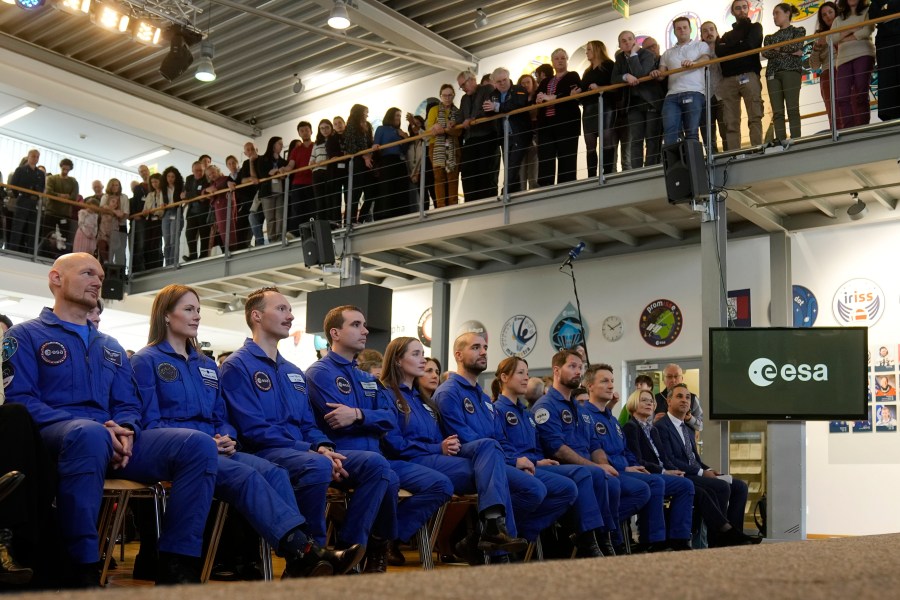 Astronauts crew leader Alexander Geerst, left, sits with candidates of the Class of 2022 at the graduation ceremony at the European Astronaut Centre in Cologne, Germany, Monday, April 22, 2024. ESA astronaut candidates Sophie Adenot of France, Pablo Alvarez Fernandez of Spain, Rosemary Coogan of Britain, Raphael Liegeois of Belgium and Marco Sieber of Switzerland took up duty at the European Astronaut Centre one year ago to be trained to the highest level of standards as specified by the International Space Station partners. Also concluding a year of astronaut basic training is Australian astronaut candidate Katherine Bennell-Pegg, who has trained alongside ESA's candidates. (AP Photo/Martin Meissner)
