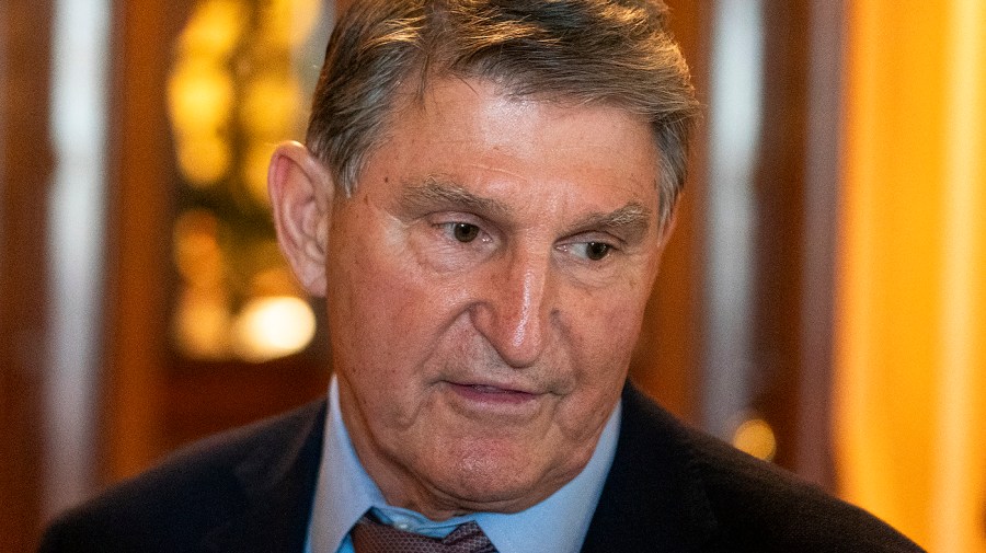 Senator Joe Manchin speaks to reporters.