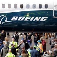 FILE- A Boeing 737 MAX 7 is displayed during a debut for employees and media on Feb. 5, 2018, in Renton, Wash. Boeing holds a virtual shareholders' meeting on Friday, May 17, 2024, as it deals with multiple federal investigations, frustrated airline customers and disappointing financial results. (AP Photo/Elaine Thompson, File)