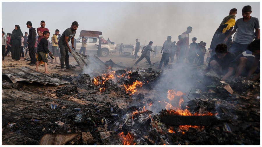 Palestinians observe the destruction caused by the attacks of Israeli army on tents of displaced Palestinians in Rafah, Gaza on May 27, 2024. (Photo by Ali Jadallah/Anadolu via Getty Images)