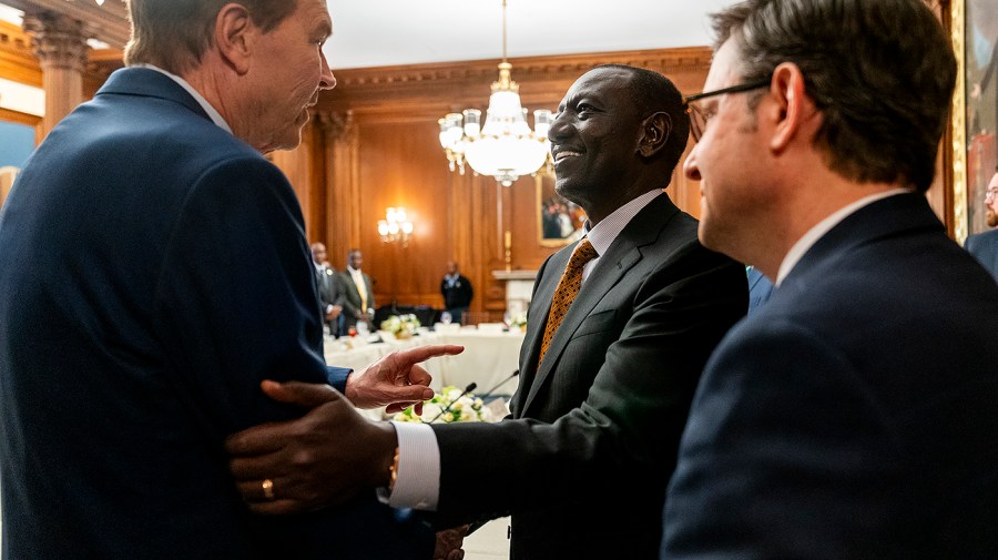 Kenyan President Willam Ruto greets U.S. Representative Vern Buchanan.