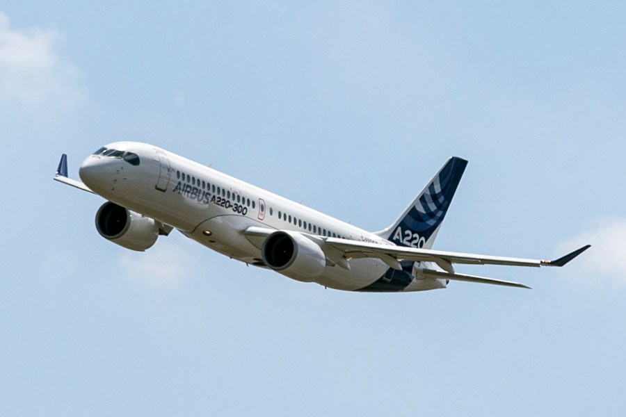 FILE - An Airbus A220 lands at Toulouse-Blagnac airport, July 10, 2018, in southwestern France. Federal regulators are investigating how parts made with counterfeit titanium wound up in some Boeing and Airbus passenger jets that were built in recent years. Boeing and Airbus said Friday, June 14, 2024, that planes containing the parts are safe to fly. (AP Photo/Frederic Scheiber, File)