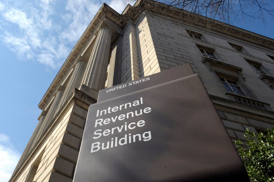 FILE - Tthe exterior of the Internal Revenue Service (IRS) building in Washington, on March 22, 2013. While taxpayer services have vastly improved, the IRS is still too slow to resolve identity theft cases, according to a new report released Wednesday, June 26, by an independent watchdog within the agency.(AP Photo/Susan Walsh, File)
