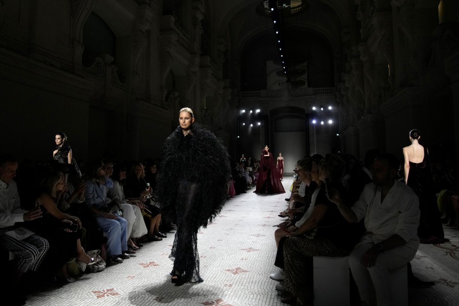 Models wear creations for the Elie Saab Haute Couture Fall-Winter 2024-2025 collection presented Wednesday, June 26, 2024 in Paris. (AP Photo/Christophe Ena)