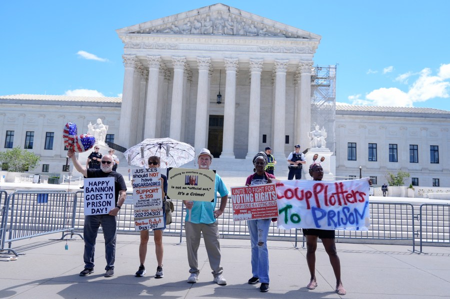 People protest outside the Supreme Court Monday, July 1, 2024, in Washington. (AP Photo/Mariam Zuhaib)