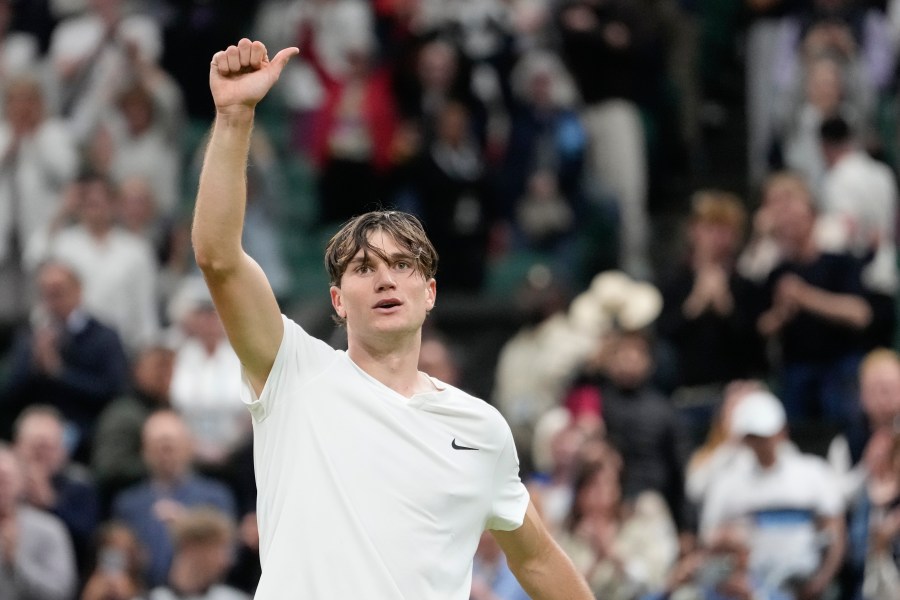 Jack Draper of Britain celebrates after defeating Elias Ymer of Sweden in their first round match at the Wimbledon tennis championships in London, Tuesday, July 2, 2024. (AP Photo/Alberto Pezzali)