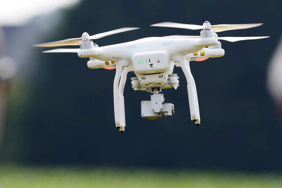 FILE - A DJI Phantom 3 drone flies during a drone demonstration at a farm and winery, on June 11, 2015 in Cordova, Md. China says it will prohibit the export of all unregulated civilian drones that could be used for military purposes or in terrorist activities and that certain drone features will be restricted as the East Asian country faces repeated Western criticism for its stance on the Russian invasion of Ukraine. (AP Photo/Alex Brandon, File)