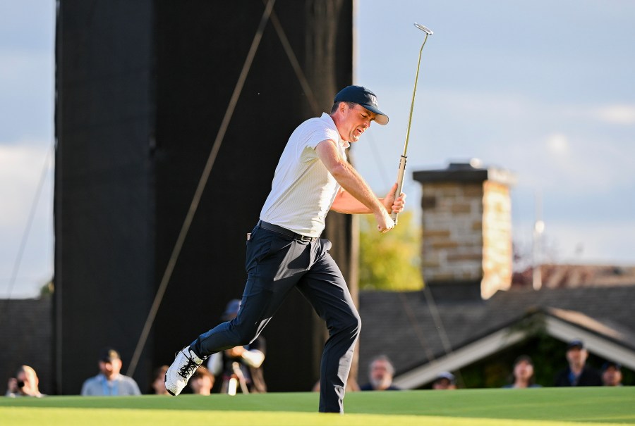 United States team member Keegan Bradley reacts on the 18th green after defeating the international team during a first-round four-ball match at the Presidents Cup golf tournament at the Royal Montreal Golf Club in Montreal, Thursday, Sept. 26, 2024. (Graham Hughes/The Canadian Press via AP)