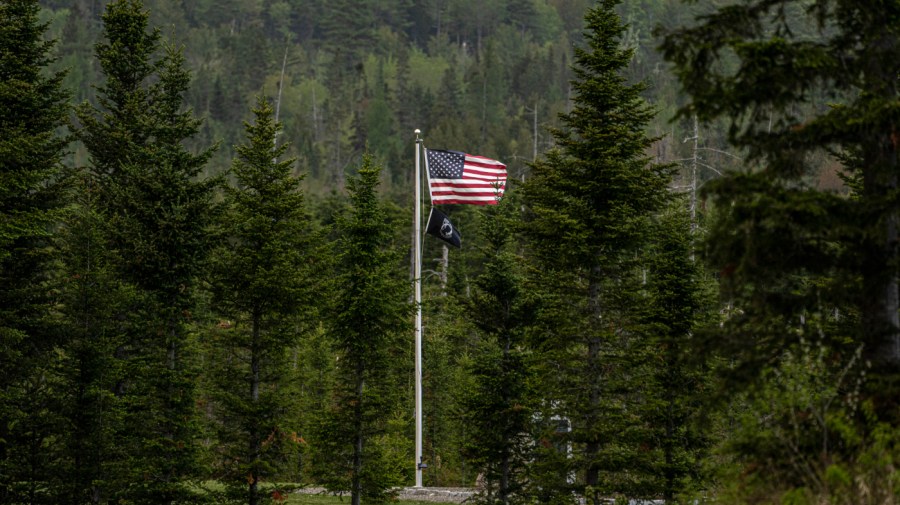 An American flag flies at Patriot Park, a collection of monuments in tribute to veterans in Columbia Falls, Maine, Saturday, May 27, 2023. The Worcester family hopes to build a $1 billion flagpole theme park nearby. (AP Photo/Robert F. Bukaty)