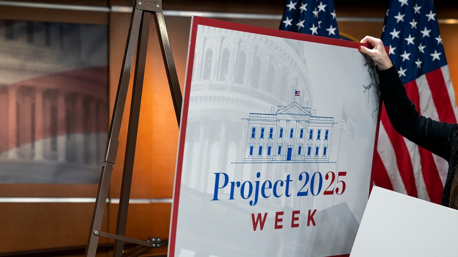 A sign for 'Project 2025 Week' is removed