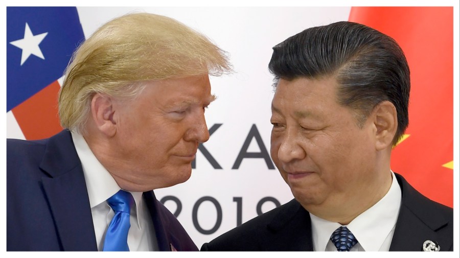 FILE - In this June 29, 2019, file photo, President Donald Trump, left, meets with Chinese President Xi Jinping during a meeting on the sidelines of the G-20 summit in Osaka, Japan. (AP Photo/Susan Walsh, File)