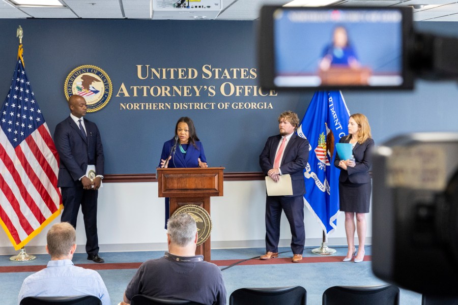 Assistant Attorney General Kristen Clarke, center, of the Justice Department's Civil Rights Division speaks about a new Department of Justice report about the state of Georgia's prisons at a press conference at the Richard B. Russell Federal Building in Atlanta, Tuesday, Oct. 1, 2024. On her left is U.S. Attorney Ryan K. Buchanan for the Northern District of Georgia and on her right are U.S. Attorney Peter D. Leary for the Middle District of Georgia and U.S. Attorney Jill E. Steinberg for the Southern District of Georgia. (Arvin Temkar/Atlanta Journal-Constitution via AP)