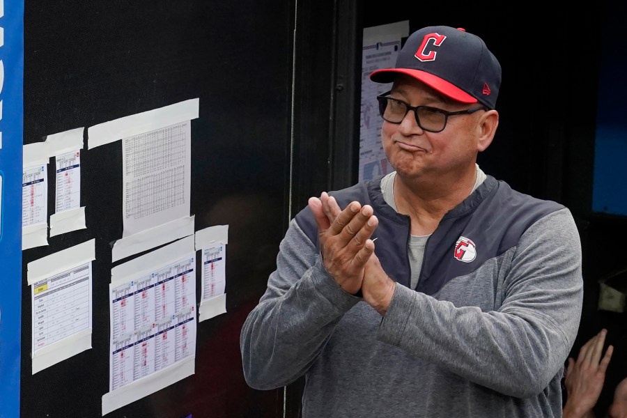 FILE -Cleveland Guardians manager Terry Francona applauds during a tribute video before the team's baseball game against the Cincinnati Reds, Wednesday, Sept. 27, 2023, in Cleveland. Terry Francona has been hired to manage the Cincinnati Reds, returning to the major leagues a year after he stepped down in Cleveland because of health. A person familiar with the situation confirmed the move on Thursday, Oct. 3, 2024 on condition of anonymity because the Reds had not announced the decision.(AP Photo/Sue Ogrocki, File)