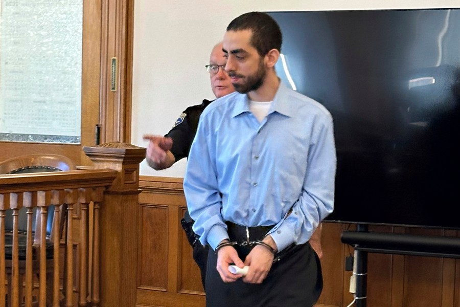 Had Matar, charged with attempted murder for stabbing author Salman Rushdie more than a dozen times, is escorted into the courtroom for a hearing in Chautauqua County Court, Friday, Oct. 4, 2024, in Mayville, N.Y. (AP Photo/Carolyn Thompson)