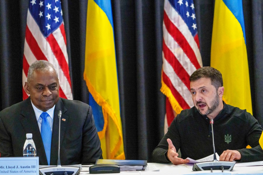 FILE - U.S. Defense Secretary Lloyd Austin, left, listens to Ukraine's President Volodymyr Zelenskyy during a meeting at Ramstein Air Base in Ramstein-Miesenbach, Germany, Friday, Sept. 6, 2024. (Andreas Arnold/dpa via AP, File)