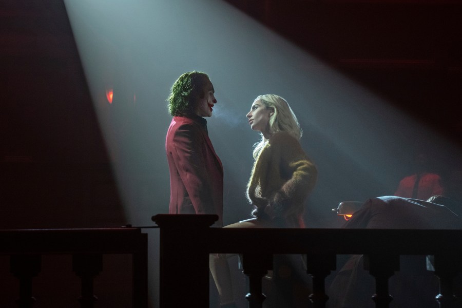 This image released by Warner Bros. Pictures shows Joaquin Phoenix, left, and Lady Gaga in a scene from "Joker: Folie à Deux." (Niko Tavernise/Warner Bros. Pictures via AP)