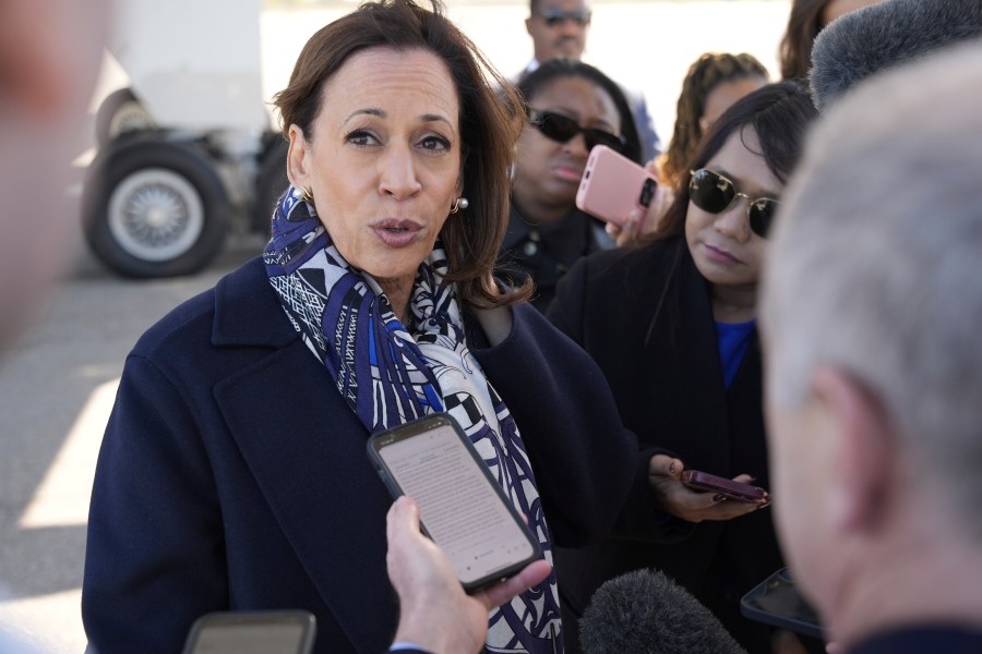 Democratic presidential nominee Vice President Kamala Harris speaks to the media before boarding Air Force Two on departure from Detroit, at Detroit Metropolitan Wayne County Airport, Wednesday, Oct. 16, 2024. (AP Photo/Jacquelyn Martin)