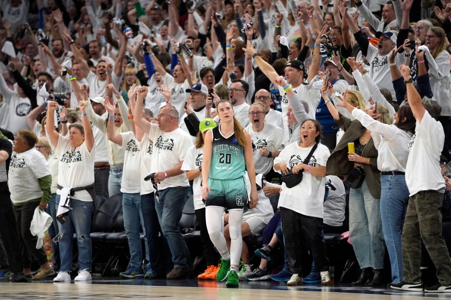 New York Liberty guard Sabrina Ionescu (20) reacts after missing a shot at the buzzer during the second half of Game 4 of a WNBA basketball final playoff series, Friday, Oct. 18, 2024, in Minneapolis. The Lynx won 82-80, forcing a Game 5 in the series. (AP Photo/Abbie Parr)