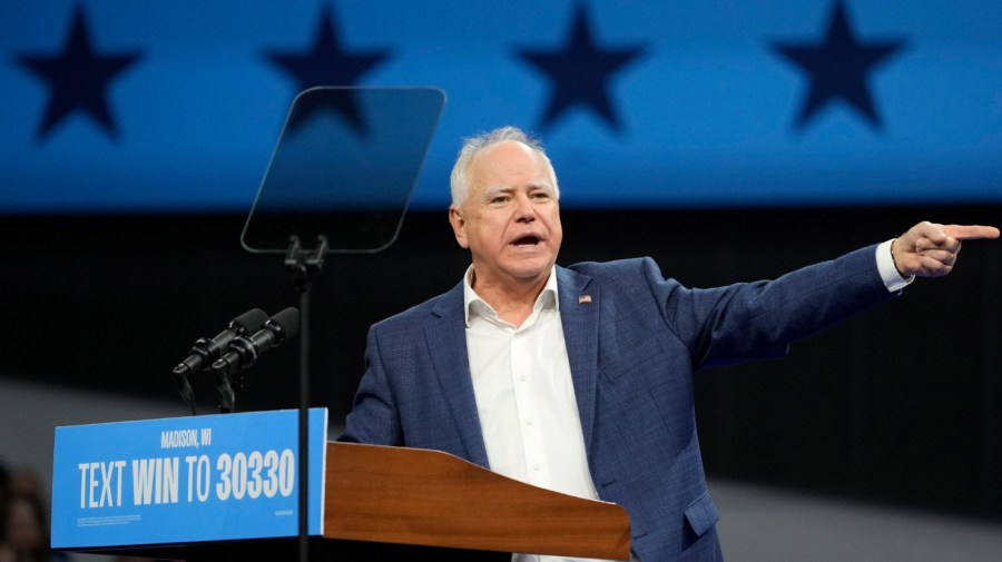 Democratic vice presidential nominee Minnesota Gov. Tim Walz speaks at a campaign event with former President Barack Obama, Tuesday, Oct. 22, 2024, in Madison, Wis. (AP Photo/Morry Gash)